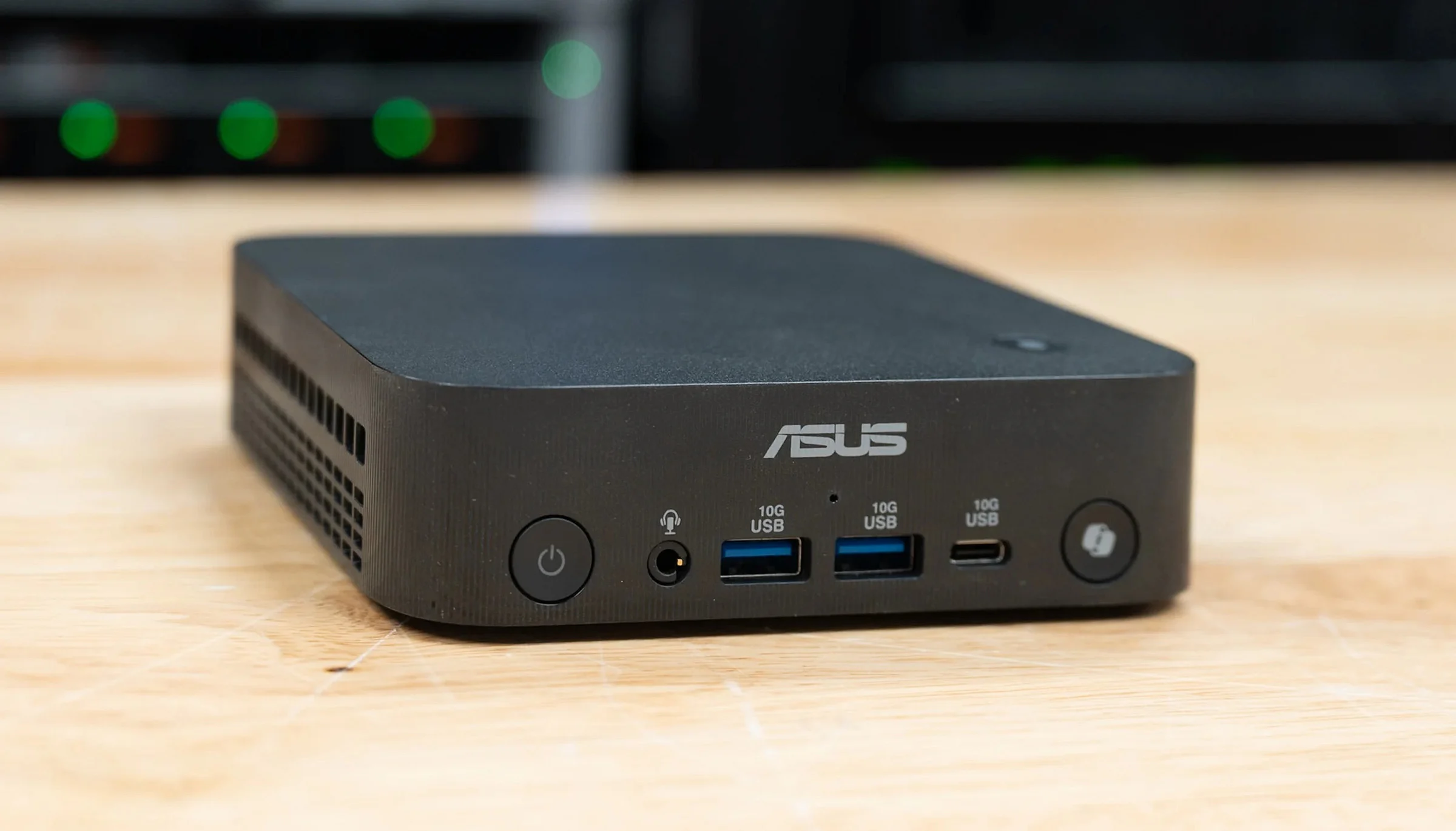 华硕 ExpertCenter PN55 mini PC, the best business mini PC of 2026, on the StorageReview lab bench