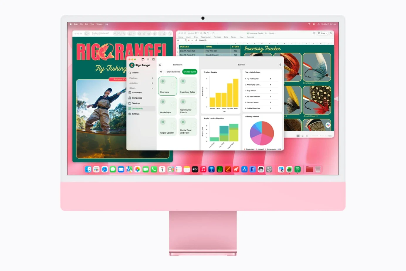 iMac 运行表格与业务应用,Apple 官方演示图。