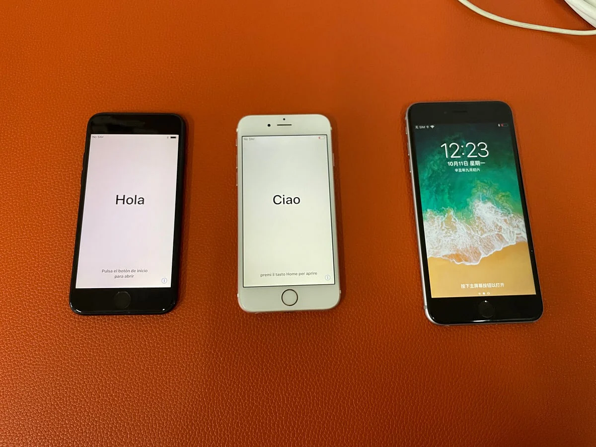 三台 iPhone 开机与初始化界面复核