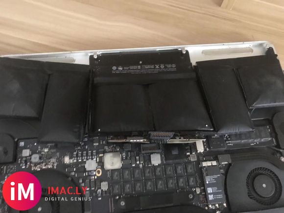 MacBook Pro笔记本电池鼓包 这个月都不知道修多少了-2.jpg